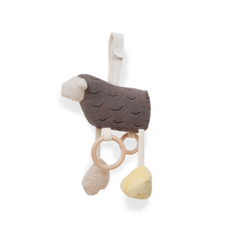 Hanging plush sheep toy with wooden rings and soft teethers for babies.