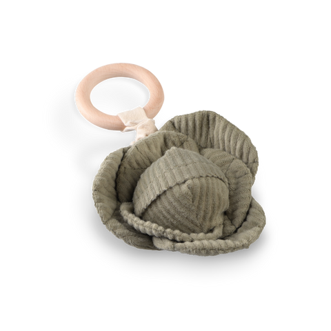 Soft, textured, green baby rattle with a wooden ring.