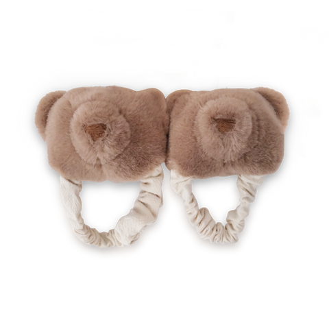 Teddy kicking rattle